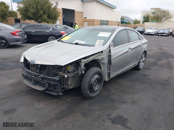 2012 Hyundai Sonata Hybrid with VIN KMHEC4A42CA040077, listed as a IAAI auction lot 42056186 with 167,621 mi miles. Bid and sale history available at carsss.com. Image 6.
