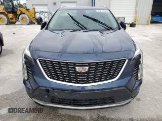 2021 Cadillac XT4 FWD Premium Luxury z VIN 1GYFZCR48MF056210, wystawiony jako Copart lot #45818245 z przebiegiem Nie podano mil oraz Nie do naprawy • Non repairable. Historia ofert i sprzedaży dostępna na DreamBid. Obrazek 5.