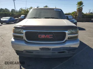 2005 GMC Yukon SLE with VIN 1GKEC13T95J150381, listed as a Copart auction lot 77405144 with 176,516 mi miles and Clean Title. Bid and sale history available at carsss.com. Image 5.