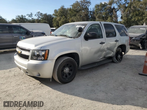 2011 Chevrolet Tahoe Commercial with VIN 1GNLC2E02BR306292, listed as a Copart auction lot 44136095 with 172,104 mi miles and Salvage title. Bid and sale history available at DreamBid. Image 1.