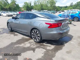 2016 Nissan Maxima SL with VIN 1N4AA6AP7GC395308, listed as a IAAI auction lot 42187762 with 154,171 mi miles and . Bid and sale history available at DreamBid. Image 3.