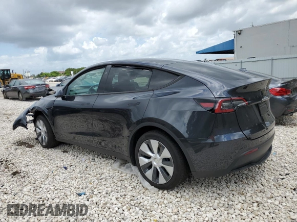 2024 Tesla Model Y with VIN 7SAYGDED2RF040079, listed as a Copart auction lot 57237054 with 2,549 mi miles and Non Repairable. Bid and sale history available at DreamBid. Image 2.