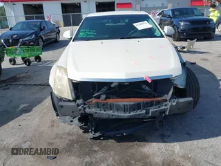 2009 Cadillac CTS RWD z VIN 1G6DF577190106800, wystawiony jako IAAI lot #42316470 z przebiegiem 147 836 mil mil oraz . Historia ofert i sprzedaży dostępna na DreamBid. Obrazek 6.