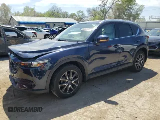 2018 Mazda CX-5 Grand Touring with VIN JM3KFADM7J0377315, listed as a Copart auction lot 53335185 with 68,462 mi miles and Salvage title. Bid and sale history available at DreamBid. Image 1.