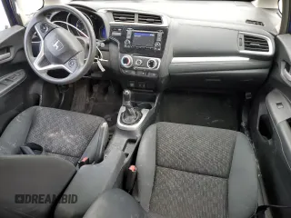 2015 Honda Fit LX with VIN 3HGGK5G51FM718512, listed as a Copart auction lot 52790065 with 111,667 mi miles and Salvage title. Bid and sale history available at DreamBid. Image 8.