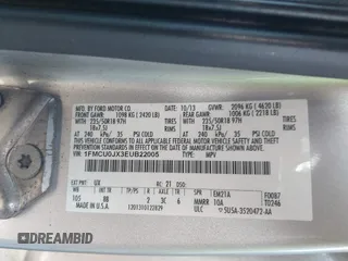 2014 Ford Escape Titanium with VIN 1FMCU0JX3EUB22005, listed as a IAAI auction lot 41610799 with 248,066 mi miles. Bid and sale history available at carsss.com. Image 9.
