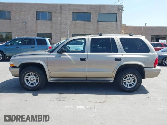2003 Dodge Durango SLT z VIN 1D4HS48N43F517701, wystawiony jako IAAI lot #42277135 z przebiegiem 135 521 mil mil oraz . Historia ofert i sprzedaży dostępna na DreamBid. Obrazek 14.