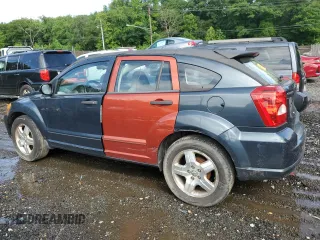 2007 Dodge Caliber SXT z VIN 1B3HB48B57D364154, wystawiony jako Copart lot #58973225 z przebiegiem 205 693 mil mil oraz Szkoda całkowita • Salvage title. Historia ofert i sprzedaży dostępna na DreamBid. Obrazek 2.