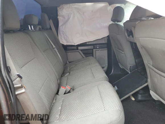 2016 Ford F-150 XLT with VIN 1FTEW1EG7GKD00973, listed as a Copart auction lot 56011785 with 128,344 mi miles and Salvage title. Bid and sale history available at DreamBid. Image 10.