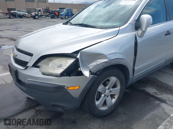 2012 Chevrolet Captiva Sport LS z VIN 3GNAL2EKXCS595459, wystawiony jako IAAI lot #42229188 z przebiegiem 139 669 mil mil oraz . Historia ofert i sprzedaży dostępna na DreamBid. Obrazek 6.