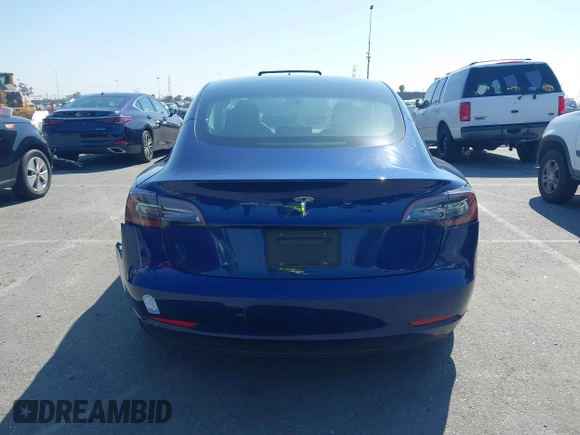 2023 Tesla Model 3 with VIN 5YJ3E1EA1PF431190, listed as a IAAI auction lot 41980007 with 26,164 mi miles and . Bid and sale history available at DreamBid. Image 16.