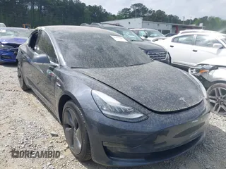 2018 Tesla Model 3 Long Range Battery z VIN 5YJ3E1EA6JF058008, wystawiony jako IAAI lot #41961589 z przebiegiem 82 642 mil mil oraz . Historia ofert i sprzedaży dostępna na DreamBid. Obrazek 1.