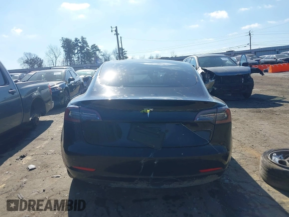 2020 Tesla Model 3 Standard Range Plus with VIN 5YJ3E1EA0LF660759, listed as a IAAI auction lot 41505250 with 63,322 mi miles and . Bid and sale history available at DreamBid. Image 16.
