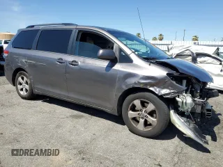2014 Toyota Sienna LE AAS with VIN 5TDKK3DC0ES512211, listed as a Copart auction lot 49673535 with 164,465 mi miles and Salvage title. Bid and sale history available at DreamBid. Image 4.