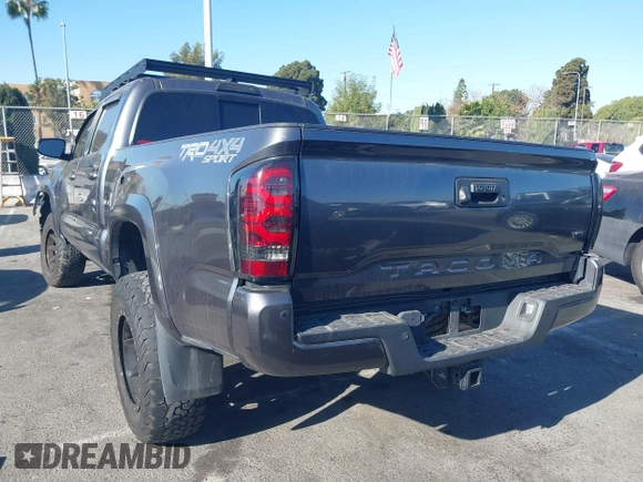 2021 Toyota Tacoma 4WD SR5 with VIN 3TMDZ5BNXMM107525, listed as a IAAI auction lot 41062698 with 41,771 mi miles. Bid and sale history available at carsss.com. Image 3.