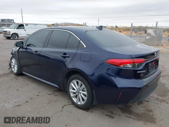 2023 Toyota Corolla Hybrid LE with VIN JTDBCMFE8PJ003081, listed as a IAAI auction lot 41041004 with 19,146 mi miles. Bid and sale history available at carsss.com. Image 3.