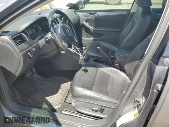 2014 Volkswagen Jetta TDI w/Premium with VIN 3VWLL7AJ4EM374570, listed as a Copart auction lot 63996195 with 186,497 mi miles and Salvage title. Bid and sale history available at DreamBid. Image 7.