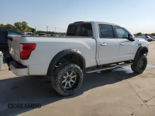 2016 Nissan Titan Platinum Reserve z VIN 1N6BA1F21GN513109, wystawiony jako Copart lot #64840434 z przebiegiem 94 263 mil mil oraz Czysty tytuł • Clean title. Historia ofert i sprzedaży dostępna na DreamBid. Obrazek 3.