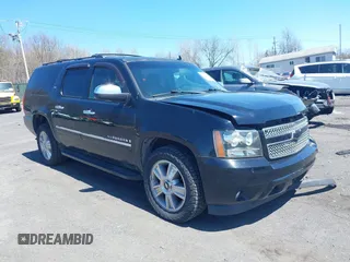 2009 Chevrolet Suburban LTZ with VIN 1GNFK36399J124158, listed as a IAAI auction lot 42063097 with 204,856 mi miles. Bid and sale history available at carsss.com. Image 1.