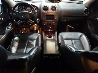 2010 Mercedes-Benz GL 450 with VIN 4JGBF7BE8AA563720, listed as a Copart auction lot 55779235 with 142,744 mi miles and Clean Title. Bid and sale history available at DreamBid. Image 9.