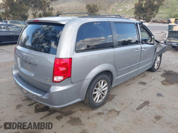 2016 Dodge Grand Caravan SXT with VIN 2C4RDGCG9GR180396, listed as a IAAI auction lot 41921312 with 130,256 mi miles and . Bid and sale history available at DreamBid. Image 4.