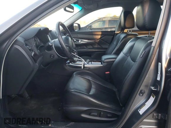 2015 Infiniti Q70 z VIN JN1BY1PR0FM830851, wystawiony jako Copart lot #87606685 z przebiegiem 116 148 mil mil oraz Szkoda całkowita • Salvage title. Historia ofert i sprzedaży dostępna na DreamBid. Obrazek 7.