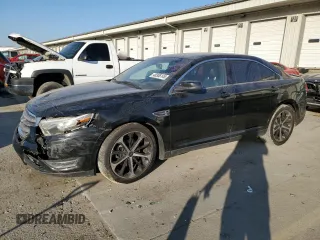 2014 Ford Taurus SEL z VIN 1FAHP2E84EG173646, wystawiony jako Copart lot #48306145 z przebiegiem 181 550 mil mil oraz Szkody całkowita. Historia ofert i sprzedaży dostępna na DreamBid. Obrazek 1.