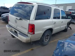 2003 Cadillac Escalade z VIN 1GYEK63N53R304400, wystawiony jako IAAI lot #41544697 z przebiegiem 207 913 mil mil oraz . Historia ofert i sprzedaży dostępna na DreamBid. Obrazek 4.