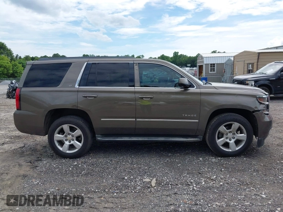 2015 Chevrolet Tahoe LT with VIN 1GNSCBKC5FR585138, listed as a IAAI auction lot 42420496 with 177,104 mi miles and . Bid and sale history available at DreamBid. Image 13.