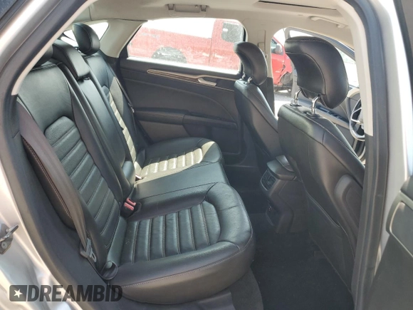 2013 Ford Fusion SE Hybrid z VIN 3FA6P0LU3DR336838, wystawiony jako Copart lot #56205445 z przebiegiem 209 164 mil mil oraz Czysty tytuł • Clean title. Historia ofert i sprzedaży dostępna na DreamBid. Obrazek 10.
