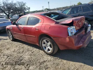 2010 Dodge Charger SXT with VIN 2B3CA3CV8AH186873, listed as a Copart auction lot 52493865 with 311,727 mi miles and Salvage Title. Bid and sale history available at carsss.com. Image 2.