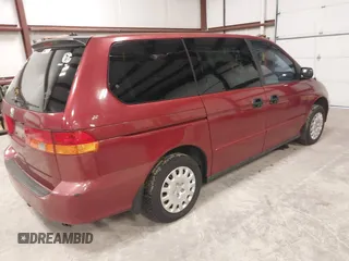 2002 Honda Odyssey LX z VIN 5FNRL18552B019426, wystawiony jako IAAI lot #41738214 z przebiegiem 202 577 mil mil oraz . Historia ofert i sprzedaży dostępna na DreamBid. Obrazek 4.