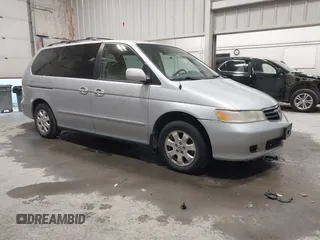2002 Honda Odyssey EX with VIN 2HKRL18602H004729, listed as a IAAI auction lot 42675856 with 190,319 mi miles and . Bid and sale history available at DreamBid. Image 1.