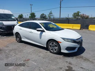 2017 Honda Civic LX with VIN 2HGFC2F54HH571516, listed as a IAAI auction lot 42626584 with 112,483 mi miles and . Bid and sale history available at DreamBid. Image 1.