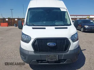 2023 Ford Transit Cargo with VIN 1FTBR1X80PKB45974, listed as a IAAI auction lot 42609404 with 35,940 mi miles and . Bid and sale history available at DreamBid. Image 12.