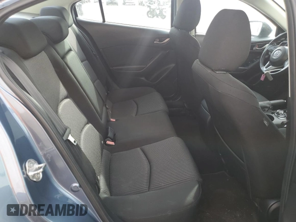 2016 Mazda 3 i Touring z VIN 3MZBM1W78GM266684, wystawiony jako Copart lot #53915435 z przebiegiem 109 314 mil mil oraz Szkoda całkowita • Salvage title. Historia ofert i sprzedaży dostępna na DreamBid. Obrazek 10.