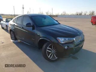 2018 BMW X4 xDrive28i with VIN 5UXXW3C59J0T80560, listed as a IAAI auction lot 41734915 with 122,850 mi miles. Bid and sale history available at carsss.com. Image 1.