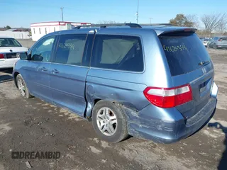 2005 Honda Odyssey EX-L with VIN 5FNRL38765B076591, listed as a IAAI auction lot 41624354 with 172,698 mi miles and . Bid and sale history available at DreamBid. Image 3.