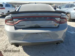 2022 Dodge Charger Scat Pack with VIN 2C3CDXGJ5NH161802, listed as a Copart auction lot 54876795 with 52,837 mi miles and Salvage Title. Bid and sale history available at carsss.com. Image 6.