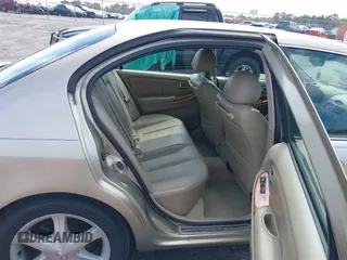 2003 Infiniti I35 Luxury with VIN JNKDA31A03T112208, listed as a IAAI auction lot 41760664 with 148,826 mi miles. Bid and sale history available at carsss.com. Image 8.