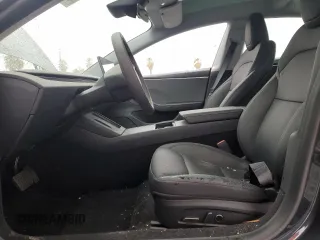 2025 Tesla Model 3 Long Range z VIN 5YJ3E1EA5SF900225, wystawiony jako Copart lot #48584355 z przebiegiem 4 869 mil mil oraz Szkoda całkowita • Salvage title. Historia ofert i sprzedaży dostępna na DreamBid. Obrazek 7.