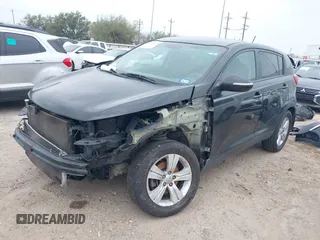 2013 Kia Sportage LX with VIN KNDPB3A20D7506063, listed as a IAAI auction lot 41796823 with 148,841 mi miles. Bid and sale history available at carsss.com. Image 2.