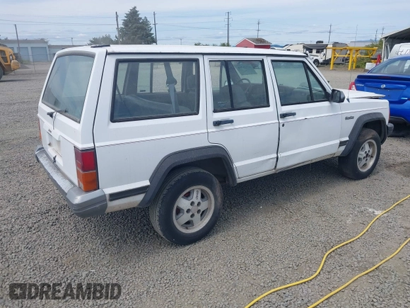 1993 Jeep Cherokee z VIN 1J4FT28PXPL560996, wystawiony jako IAAI lot #42526590 z przebiegiem 304 201 mil mil oraz . Historia ofert i sprzedaży dostępna na DreamBid. Obrazek 4.