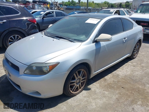 2006 Scion tC with VIN JTKDE177660068512, listed as a IAAI auction lot 42142732 with 304,731 mi miles. Bid and sale history available at carsss.com. Image 2.