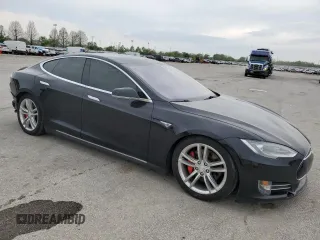 2015 Tesla Model S 85D with VIN 5YJSA1H42FF089907, listed as a Copart auction lot 53964335 with 70,386 mi miles and Salvage Title. Bid and sale history available at carsss.com. Image 4.