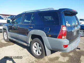 2003 Toyota 4Runner SR5 with VIN JTEZT14R238001097, listed as a IAAI auction lot 41266011 with 180,905 mi miles. Bid and sale history available at carsss.com. Image 3.
