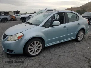 2009 Suzuki SX4 Man Sport FWD with VIN JS2YC414696203770, listed as a Copart auction lot 82474354 with 85,453 mi miles and Clean Title. Bid and sale history available at carsss.com. Image 1.