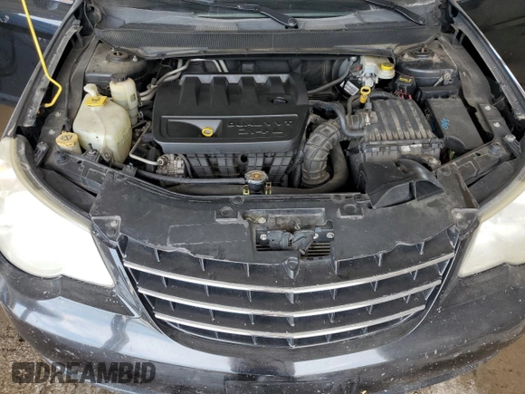 2010 Chrysler Sebring Limited with VIN 1C3CC5FB2AN229671, listed as a Copart auction lot 62181015 with 229,390 mi miles and Salvage title. Bid and sale history available at DreamBid. Image 11.