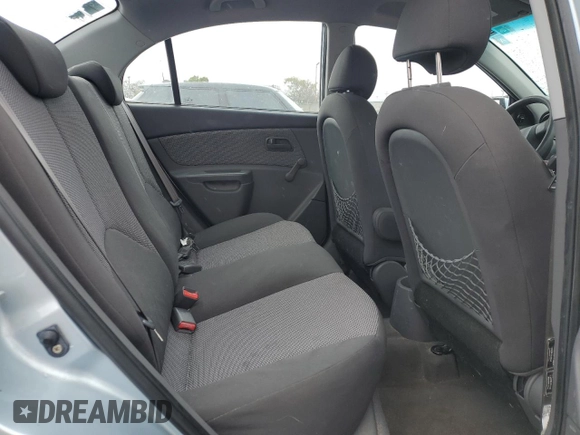 2009 Kia Rio LX with VIN KNADE223396443465, listed as a Copart auction lot 51370975 with 110,952 mi miles and Salvage Title. Bid and sale history available at carsss.com. Image 10.