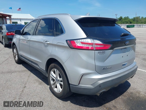 2019 Ford Edge SEL with VIN 2FMPK3J94KBB67207, listed as a IAAI auction lot 42758134 with 154,823 mi miles and . Bid and sale history available at DreamBid. Image 3.